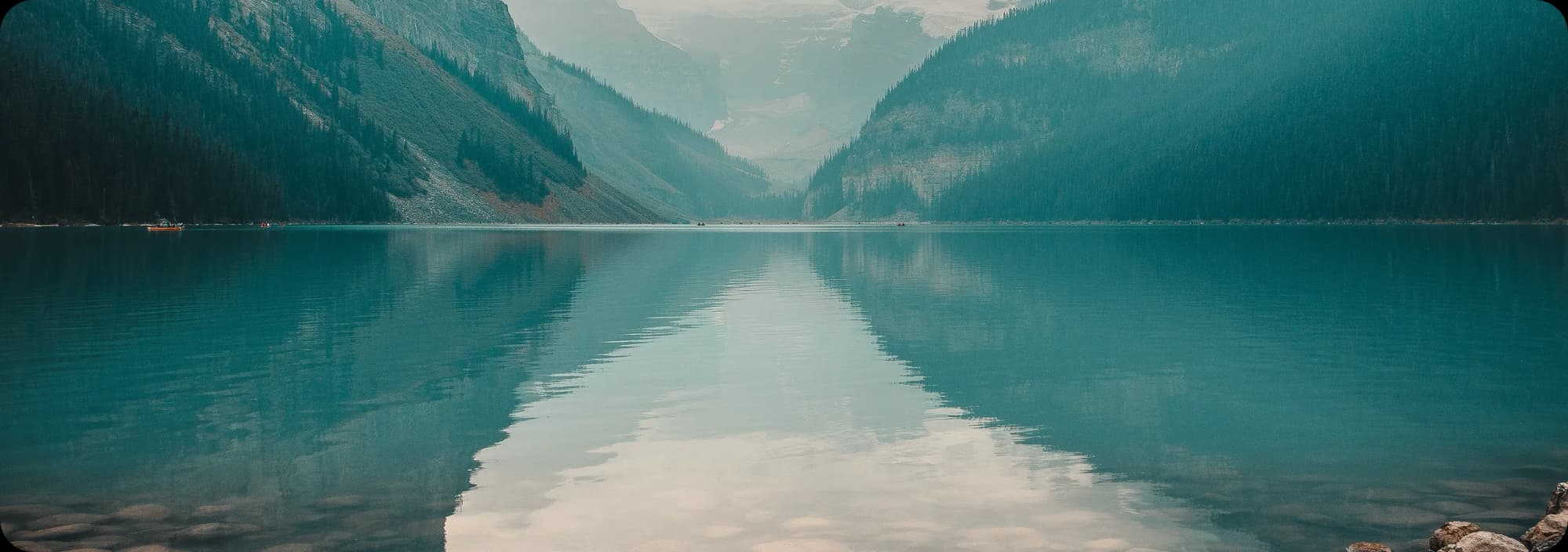 Lake Louise — still water mirroring the mountains